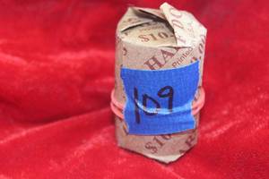 lot 109 image: Roll of Kennedy Half Dollars