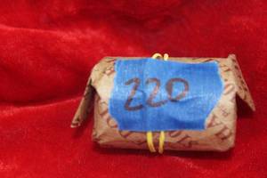 lot 220 image: Roll of Kennedy Half Dollars