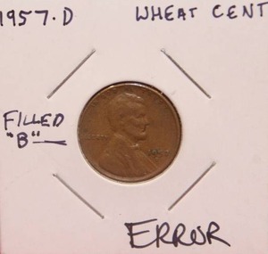 lot 66 image: ERROR 1957 D Wheat Cent Filled B