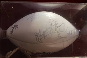 lot 2 image: NFL Wilson Football Signed by Peyton Manning and many others