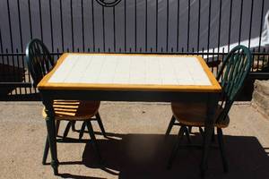 lot 406 image: Wood and Tile Farmhouse Table with Two Wooden Chairs