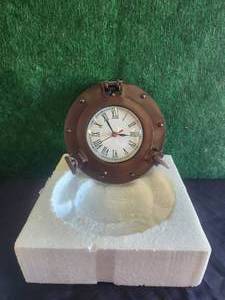 lot 33 image: Port hole wall clock
