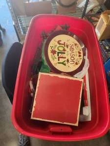 lot 58 image: Bin of Christmas decor.