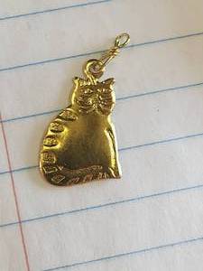 lot 63 image: Generous selection of metal pendants and charms for jewelry and craft making