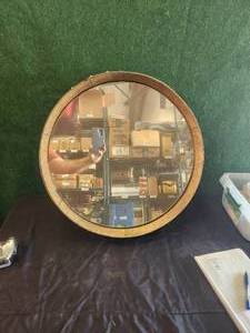 lot 80 image: Wine barrel end mirror