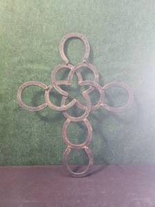 lot 104 image: Large cross made of horseshoes