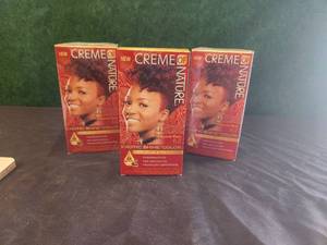 lot 136 image: Selection of 7 Creme of Nature hair color - Burgundy Blaze 6.2