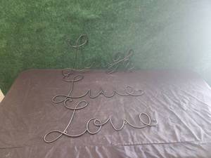 lot 172 image: Live, Love, Laugh metal wall decor.
