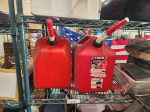 lot 214 image: Selection of 2 - 5-gallon plastic gas cans