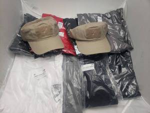 lot 622 image: Lot of DSG 2XL Shirts & Hats.  Includes 3 Hold Fast Shirts (Red, Grey & Black), 3 DSG Badge Logo Shirts (White, Grey & Black), 2 Long Sleeve Badge Logo Shirts (Grey & Black) & 2 DSG Hat Adjustable Hats