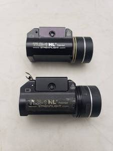 lot 676 image: Lot of 2 Streamlight TLR-1 HL Pistol Lights.  UNTESTED