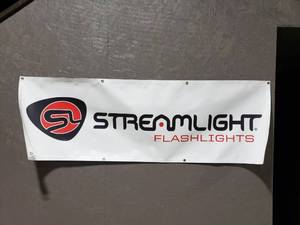 lot 896 image: Streamlight Flashlights All Weather Banner.  Measures 6 x 2