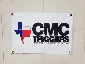 lot 898 image: CMC Triggers All Weather Banner.  Measures 3 x 2