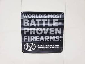 lot 899 image: Large FN Firearms Adhesive Backed Vinyl Display Sticker.  Measures 2 x 2