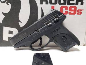 lot 1003 image: Ruger LC9s 9mm Compact Pistol w Magazine.  GUN HAS SOFT PUTTY IN IN CREASES & GAPS.  Will need to be dismantled & cleaned.