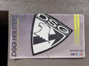 lot 1032 image: DSG Holsters Banner.  Measures 5 x 3