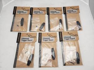 lot 1164 image: MAGPUL Enhanced Aluminum Trigger Guard - QUANTITY 7 - BID IS TIMES THE QUANTITY