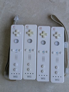 lot 91 image: Lot of 4 - Nintendo Wii Controllers