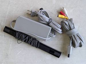 lot 95 image: Nintendo Wii Power Supply, Sensor Bar & Video Cable