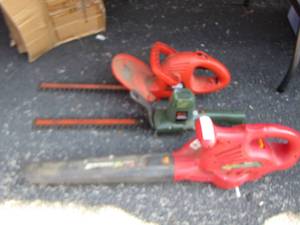 lot 48 image: 2 black and decker hedge trimmers and a blower