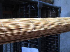 lot 71 image: ROLLED BAMBOO SHADE