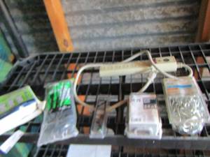 lot 80 image: chain, extension cord, nails, zip ties,
