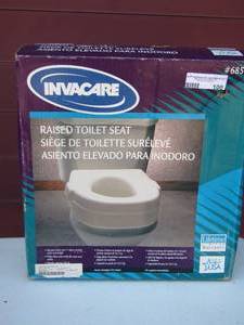 lot 100 image: Invacare raised toilet seat