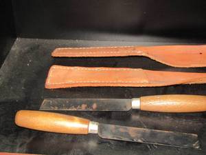 lot 191 image: scrappers and knife with leather holder