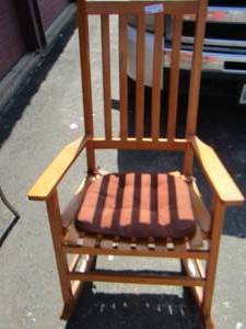 lot 192 image: Wooden rocker with cushion seat