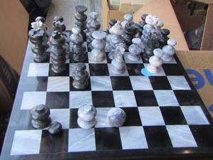 lot 29 image: Glass chess set , a few pieces are broke east fix shows in pic