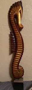 lot 28 image: WOODEN SEAHORSE ...45 H   8W