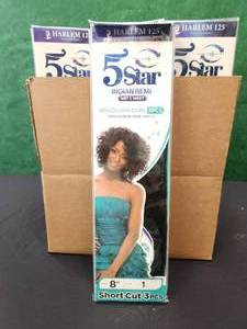 lot 31 image: Generous selection of 100% human hair wigs
