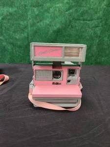 lot 32 image: Polaroid Cool Cam camera and case