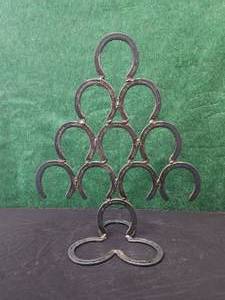 lot 44 image: Home Decor. tree made from horseshoes