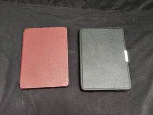 lot 129 image: Pair of Kindles - no cords
