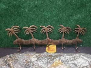lot 135 image: Selection of 5 metal Palm tree coat hangers