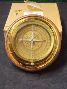 lot 192 image: Brass and wood directional desk top compass