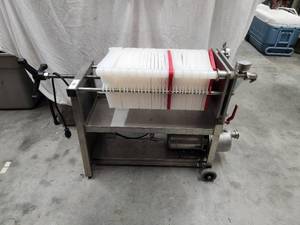 lot 89 image: Plate and frame stainless steel wine filter