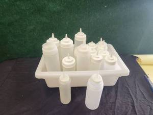 lot 250 image: Selection of plastic condiment bottles