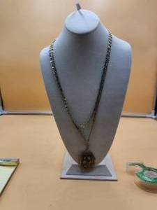 lot 18 image: Vintage Crown Trifari long gold necklace with pendant
