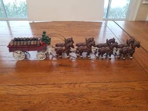 lot 5 image: Vintage Cast Iron beer wagon and horses with wood barrels