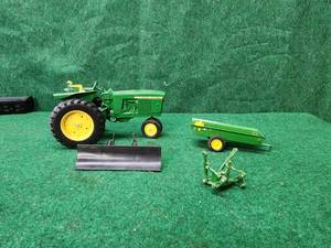 lot 41 image: John Deere tractor and accessories - toy diecast