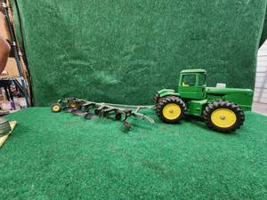 lot 97 image: John Deere diecast tractor and disc