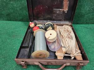 lot 132 image: Metal case with fishing supplies including 2 Zebco 404 reels