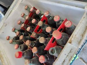 lot 299 image: Selection of vintage coke bottles