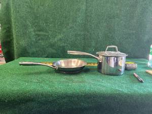lot 318 image: Stainless steel frying pan and saucepan  Tramontina