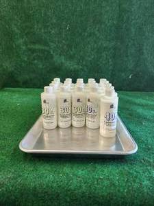 lot 355 image: Selection of 21 bottles - #30&40v cream peroxide developer