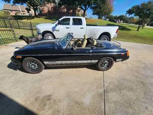 lot 1 image: 1980 MGB Limited Edition - Has Title - Runs - has new tires, battery, bearing, fuel pump and sending unit, new carpet, new brakes, new filters, new choke, new seat belts, carb has been rebuilt. Needs radio installed, brake light on