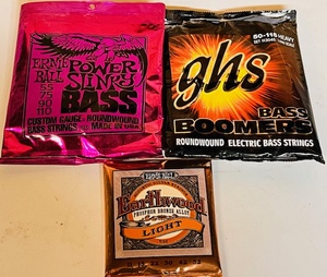 lot 43 image: Three (3) Packs of Bass &amp Acoustic Guitar Strings - Including Earnie Ball Earthwood, Power Slinks, &amp GHS Bass Boomers