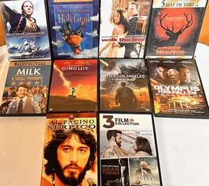lot 242 image: Ten (10) Memorable Movie DVDs - Including Special Edition Monty Pythons Holy Grail, Walk the Line,&amp Deer Hunter